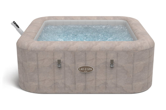 Inflatable hot tub with water and 'Lay-Z-Spa' branding on a white background