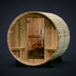 Audra Canopy Wooden barrel sauna with interior view on a white background