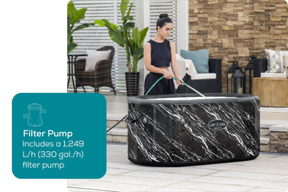 Woman filling an inflatable hot tub with a filter pump labeled feature.