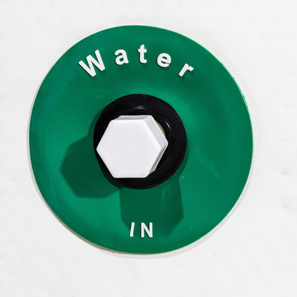 Green valve cover with 'Water In' text on a white background