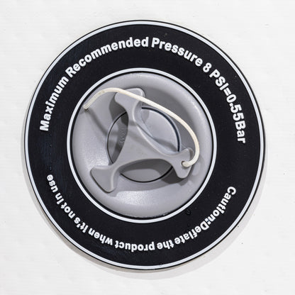 Close-up of a pressure valve with text on a white background