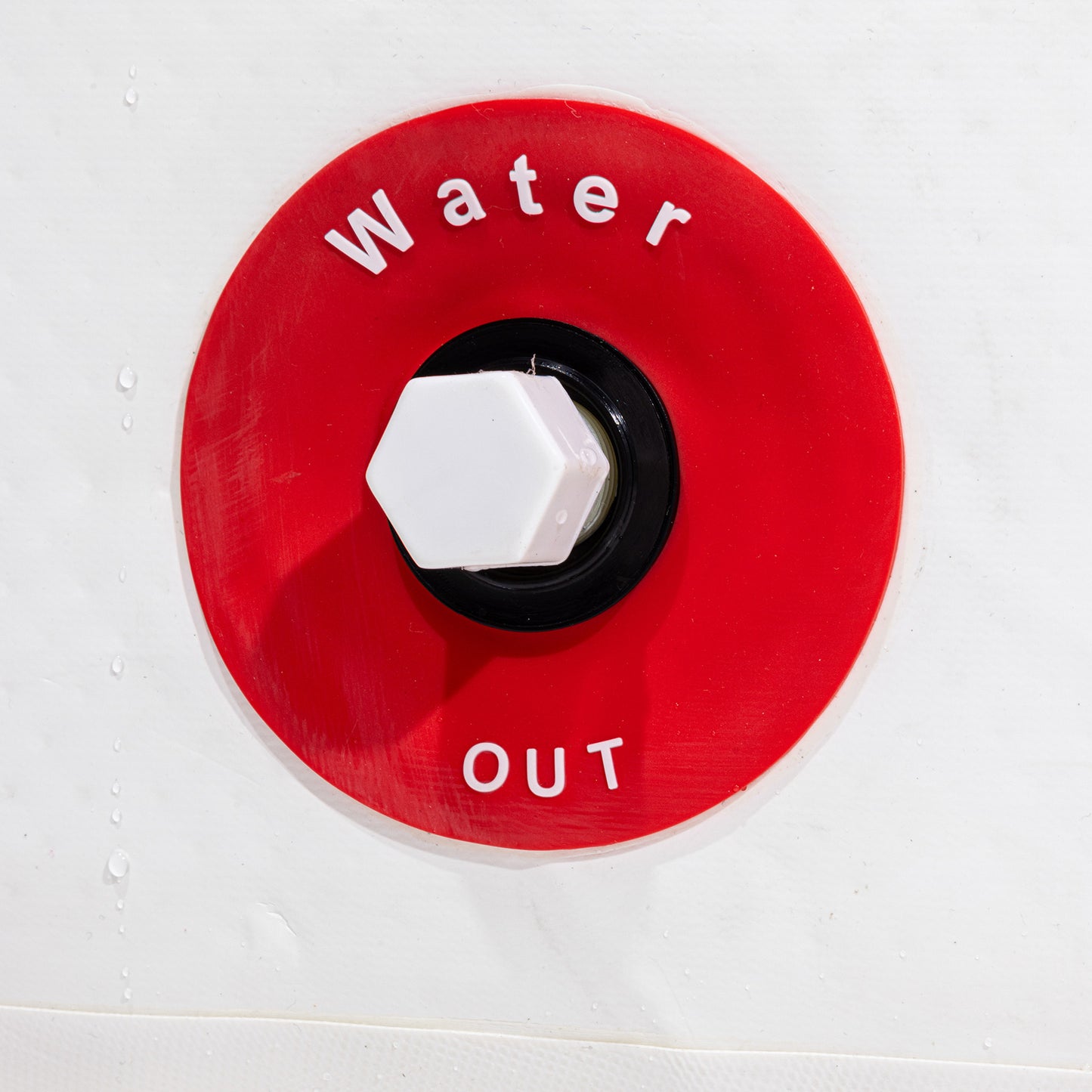 Red 'Water Out' valve on a white background