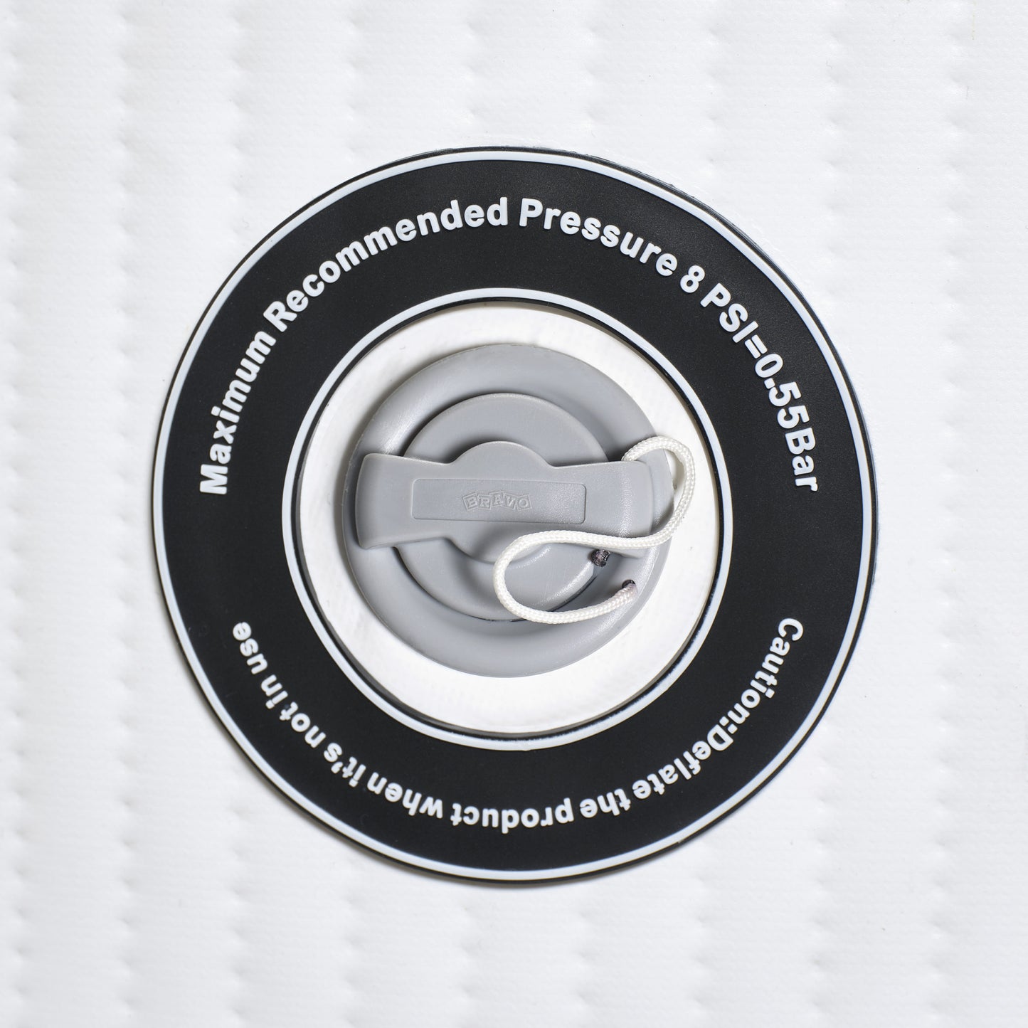 Close-up of a pressure valve with text on a white background