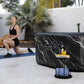 Woman exercising outdoors with a hot tub in the background